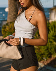 Woven top. Asymmetric neckline. Elastic steps. Beaded details. Ruched side. Side zipper closure. Fully lined. blue tank top. blue asymmetrical tank top. tank top with beads. summer outfit. summer going out top. beach vacation outfit. beach vacation top. fancy dinner top. european summer outfit. european summer top. european summer outfit inspo. vacation outfit