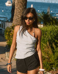 Woven top. Asymmetric neckline. Elastic steps. Beaded details. Ruched side. Side zipper closure. Fully lined. blue tank top. blue asymmetrical tank top. tank top with beads. summer outfit. summer going out top. beach vacation outfit. beach vacation top. fancy dinner top. european summer outfit. european summer top. european summer outfit inspo. vacation outfit