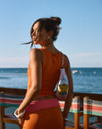 Reversible knit tank. Fixed straps. Raw edge hem. Fully lined. Orange tank top. Pink tank top. summer outfit. summer going out set. summer going out top. beach vacation outfit. fancy dinner outfit. european summer outfit. european summer top. european summer outfit inspo. vacation outfit