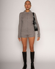 Grey Cable knit cardigan
Front button down closure
Ribbed collar
Has stretch
Unlined
Frankies knit dupe