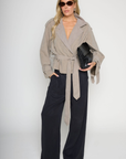 green Cropped trench coat
Collared
Adjustable belt tie
Unlined
fall jacket
fall outfit
fall coat
green trench coat