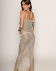 TOP:
Metallic knit cowl neck tank top
Unlined
Length: 17"
Polyester/Metallic
BOTTOM:
Metallic knot maxi skirt
Back slit
Elastic waistband
Unlined
Length: 43"
metallic gold maxi skirt set