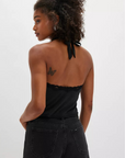 black V neck line halter top
Adorned with lace details
Adjustable tie closure at the back