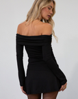 Knit dress. Folded elastic off the shoulder neckline. Long sleeves. Ruched sides. Fully lined. black mini dress. holiday dress. fall dress. friendsgiving outfit. thanksgiving outfit. off the shoulder dress
