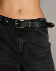 Studded faux leather belt.