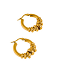 18K Gold Non-Tarnish Two Tone Hoop Earrings
18K Gold Plating
Stainless Steel
Measurement (L x W inch): 1.12 x 0.97
Lead-free
Nickel-safe
Hypoallergenic
Water Resistant