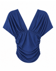 blue Knit batwing top
Short sleeve
V neckline
V open back
Elastic waistband
Cinched sides
Unlined