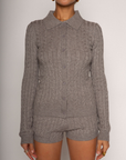 Grey Cable knit cardigan
Front button down closure
Ribbed collar
Has stretch
Unlined
Frankies knit dupe