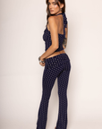 navy and white polka dot halter top with adjustable neck tie
navy and white fold over stretchy pants