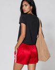 red Satin track shorts
Mini length
Inner adjustable drawstring
Elastic waistband
Unlined