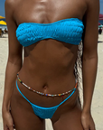 Strapless smocked bandeu bikini top
Silky, buttery-soft matte Italian recycled fabric
Runs small
blue strapless bikini top
blue swimwear
blue bandeau bikini top
resort wear bikini