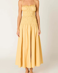 yellow Smocked maxi dress
Straight neckline
Adjustable spaghetti straps
Gathered bust with tiered smocking
Back cutout detail
Side pockets
Fully lined