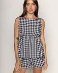 TOP:
Gingham printed flowy tank top
Ruched side ties
Back button closure
Unlined
Length: 21"
Cotton
BOTTOM:
Gingham printed shorts
Elastic waistband
Unlined
Length: 11.5"
Cotton
black and white gingham printed short set
summer set