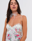 Floral printed satin maxi dress. Adjustable tie straps. Front slot. Adjustable back tie closures. Unlined for love and lemons dress. floral slip dress with lace detail and slit.