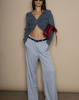 Woven wide leg pants. Hook and eye and zipper fly. Side pockets. Faux back pocket. Unlined. grey slacks. gray slacks. work pants. work slats.