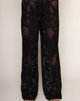 black Open knit lace cover up pants
Elastic waistband
Unlined/sheer