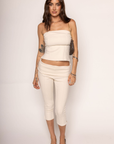 TOP
Tube top
Sweater material
Unlined
Length: 14"
Polyester/Spandex
BOTTOM
Capri pant
Sweater material
Fold over
Length: 28.5"
Polyester/Spandex
cream tube top and capri pant set