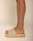 Platform braided raffia sandal
Padded insole
Slip on style
Jute/Synthetic