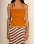 Halter top
Fixed neck strap with O ring hardware
Lined
orange halter top
going out top