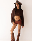 brown and orange striped booty shorts
festival outfit
coachella outfit
stagecoach outfit