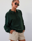 Knit top. Collar neckline. Front button down closure. Unlined. green sweatshirt. fall outfit. fall top. fall transition. cute casual outfit.