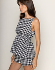 TOP:
Gingham printed flowy tank top
Ruched side ties
Back button closure
Unlined
Length: 21"
Cotton
BOTTOM:
Gingham printed shorts
Elastic waistband
Unlined
Length: 11.5"
Cotton
black and white gingham printed short set
summer set