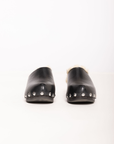 black leather fur lined clogs