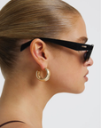 Sleek rectangular sunglasses
Featuring a structured silhouette with a bold frame and tonal lenses
Chunky acetate frame
Wide temples (arms) for a bold finish
Scratch resistant lenses
black rectangle sunglasses