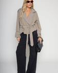 green Cropped trench coat
Collared
Adjustable belt tie
Unlined
fall jacket
fall outfit
fall coat
green trench coat