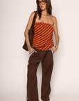brown Linen track pants
Contrast stripe at side seam
Elastic waistband
Adjustable inner waistband tie
Unlined