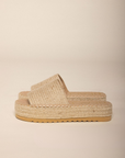 Platform braided raffia sandal
Padded insole
Slip on style
Jute/Synthetic