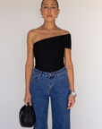 black Ribbed bodysuit
One shoulder neckline
Snap bottom closures
Thong back
Unlined
going out top