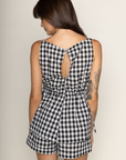 TOP:
Gingham printed flowy tank top
Ruched side ties
Back button closure
Unlined
Length: 21"
Cotton
BOTTOM:
Gingham printed shorts
Elastic waistband
Unlined
Length: 11.5"
Cotton
black and white gingham printed short set
summer set