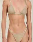 Triangle metallic bikini top
Adjustable straps
Shimmer detailing
gold bikini top