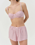 pink Striped unlined bra
Underwire cups
Adorned with picot trims
Decorative bow at front
Adjustable straps
pink bra
for love & lemons bra