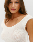 white Crochet mini dress
Custom rose motif layout
Wear the wide neckline on or off the shoulder for styling versatility
Body contouring fit
Custom crochet trim
Custom crochet rose motifs