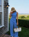 blue Striped off the shoulder top
Asymmetrical hem
Twisted strap
Side zipper
Unlined
hamptons east coast outfit