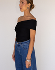 black Ribbed bodysuit
One shoulder neckline
Snap bottom closures
Thong back
Unlined
going out top