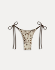 Exclusively from the JENNIE x Frankies Bikinis collaboration.
Reversible design: animal print on one side, striped print on the other bikini bottom
Low-rise fit
Cheeky coverage
String side ties
Satin shine swim fabric
Nylon/Spandex
