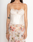 cream Sleek satin bustier with lace detailing
Fully boned bodice
Adjustable lace-up back
Skinny tie bow
Rosette adornments
Lined at cups
Adjustable shoulder straps
Polyester/Elastane
cream lingerie bustier top