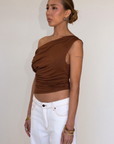 brown Ruched tank top
Asymmetric waistline
Sleeveless
Draped neckline/ cowl neck
Open back with tie closure
Elastic back
Has stretch
Partially lined
going out top
summer tank top
