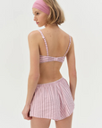 pink Striped unlined bra
Underwire cups
Adorned with picot trims
Decorative bow at front
Adjustable straps
pink bra
for love & lemons bra