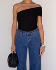 black Ribbed bodysuit
One shoulder neckline
Snap bottom closures
Thong back
Unlined
going out top