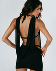 Cut from lightweight Lyocell Tissue Jersey
Deep cowl halter neckline
Reversible silhouette that can be worn front to back or back to front
Doubled skirt smooths
Adjustable length lets you wear her shorter or longer
Seamless, flattering
black mini dress with deep cowl neckline
Length: 31.5"