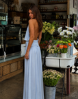blue Halter maxi dress
Hook and eye clasp neck closure
Open back
Partially lined