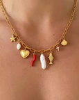 18K Gold Non-Tarnish Pepper Fish Pearl Charm Necklace
18K Gold Plating Stainless Steel
Pendant Size: 0.5 - 1.1 inches
Chain Length: 17.7"
Extension Length: 2"
Lead and Nickel Free
Hypoallergenic
Water Resistant