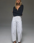 white High rise barrel jean
Wear true to size for a slim, relaxed fit, or size up for a looser look
Finished with Rolla’s signature vintage trims
Zip fly closure