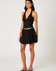 black Poplin halter corset top
Deep V neckline
Scallop edge trim
Hook & eye detail at front
Side zipper closure
Lined
