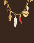 18K Gold Non-Tarnish Pepper Fish Pearl Charm Necklace
18K Gold Plating Stainless Steel
Pendant Size: 0.5 - 1.1 inches
Chain Length: 17.7"
Extension Length: 2"
Lead and Nickel Free
Hypoallergenic
Water Resistant