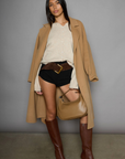 Fuzzy knit cardigan. Crewneck. Front button down closures. Long sleeves. Unlined. tan cardigan. fall cardigan. fall outfit. layering piece